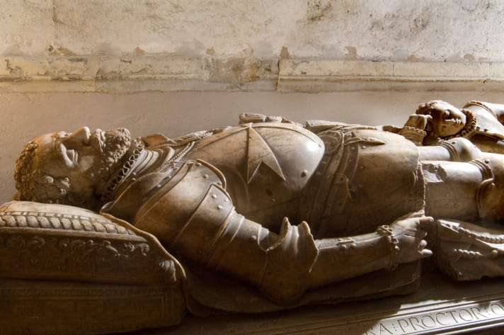 16th century carved alabaster effigy of a Knight of the Order of St John, on display in the Crypt of the Priory Church