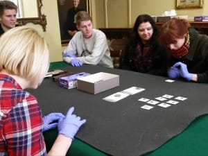 Students examine some Crusader coins at the Museum.