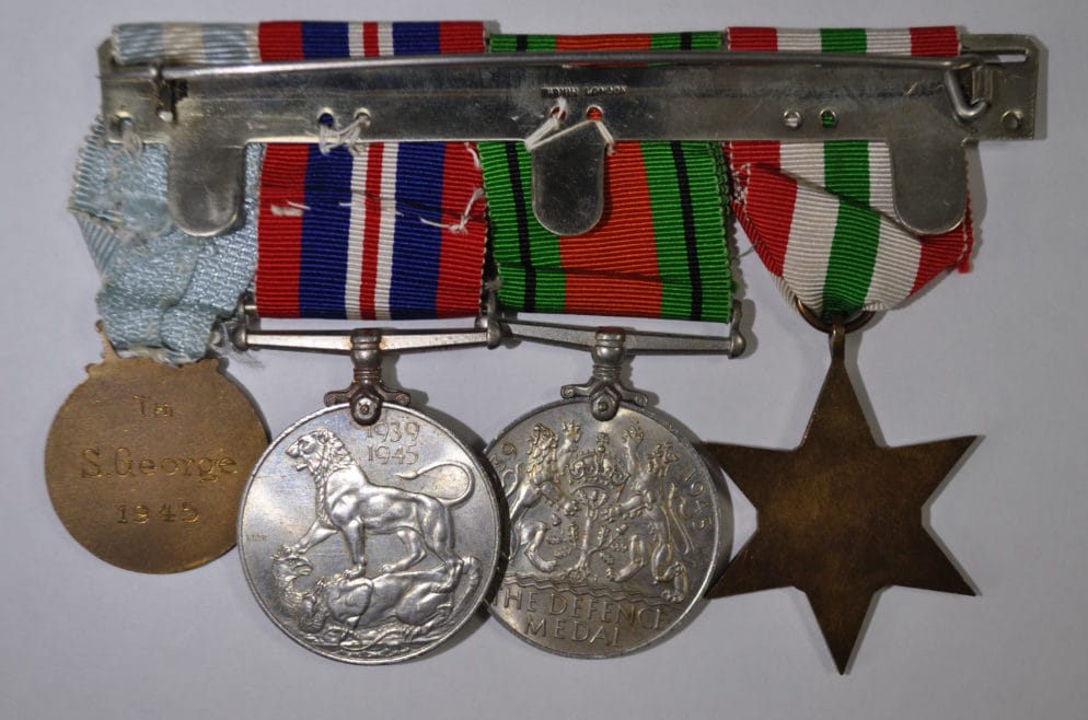 Susie's medal set: Bronze Greek Red Cross Medal, War Medal 1939-45, Defence Medal, Italy Star.