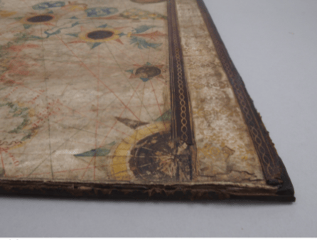 After treatment - the corners have been reinforced, the whole thing flattened and the split spine repaired.