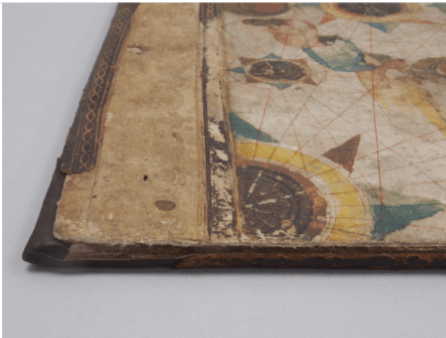 After treatment - the corners have been reinforced, the whole thing flattened and the split spine repaired.